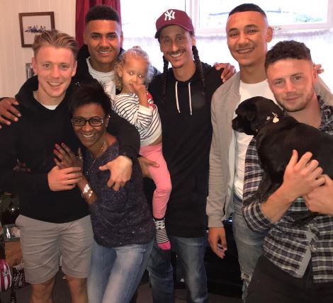 Delsi-May with her family